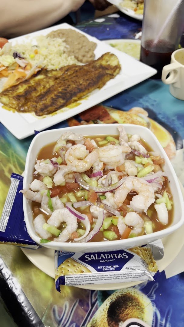 Seafood plates on a casual restaurant table.